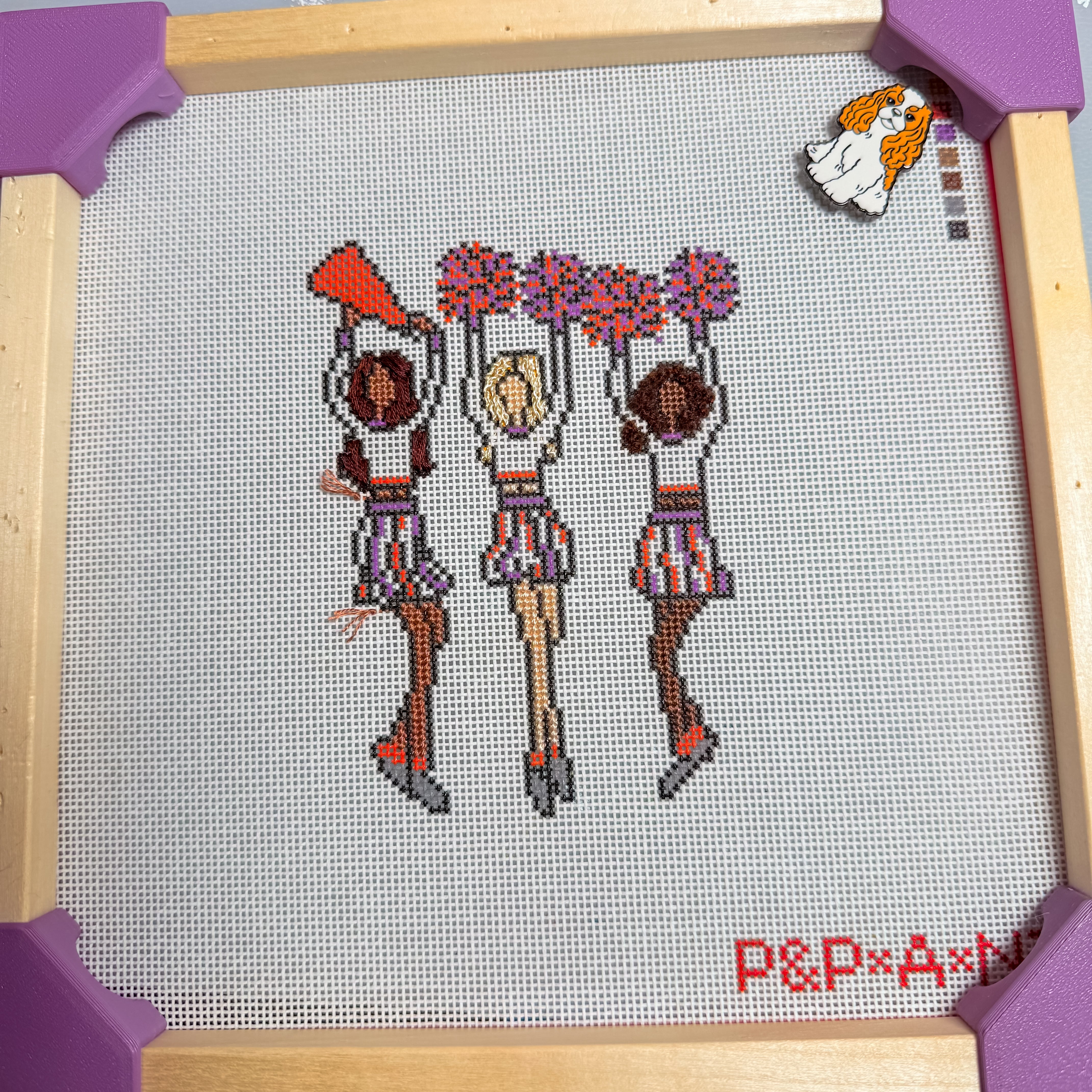 Orange and Purple Cheerleaders